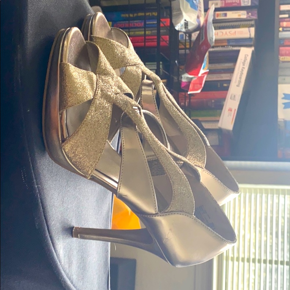 Gold high heel shoes